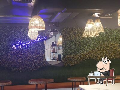 Take a seat at one of the tables at Super chai
