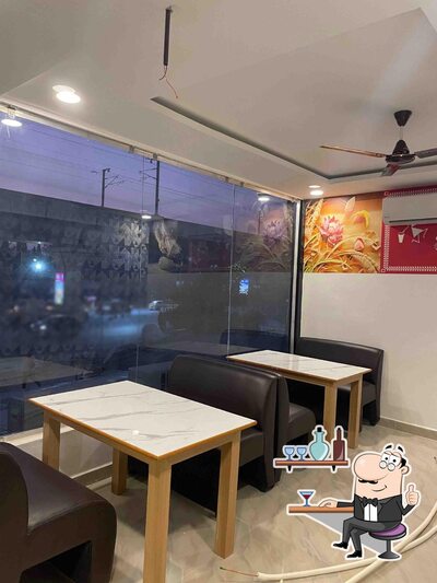 Take a seat at one of the tables at Anantha Ruchulu
