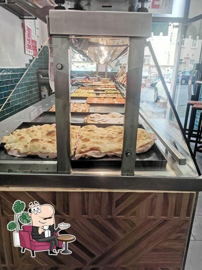 Gli interni di Pizzeria e sfizi a 360°