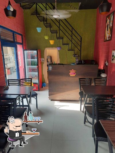 Take a seat at one of the tables at Domirick Pizza