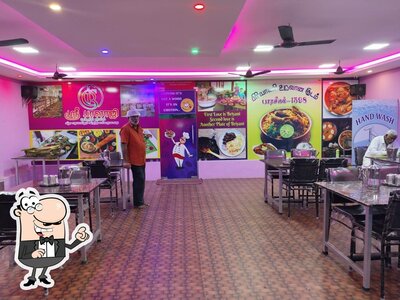 Take a seat at one of the tables at BIRIYANI.COM