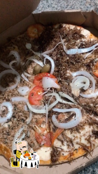 Comida em Pizzaria e Restaurante Caponga