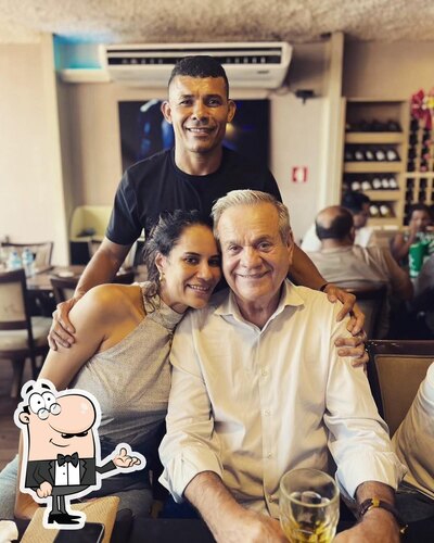 Sente em uma das mesas no Churrascaria Mister Grill