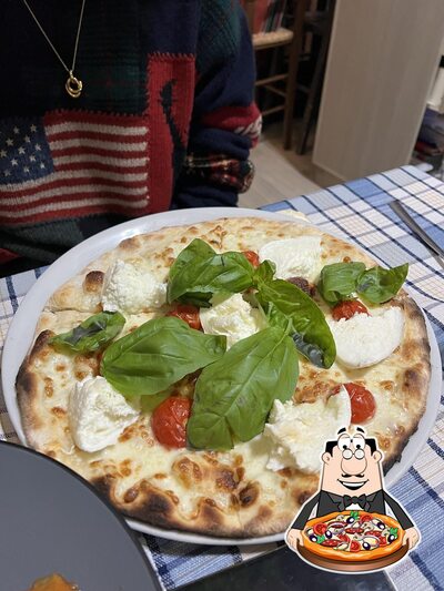 A Ristorante Pizzeria Castello, puoi goderti una bella pizza