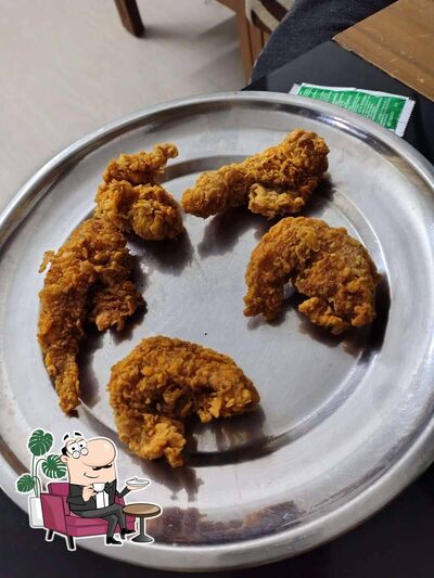 Take a seat at one of the tables at KFC