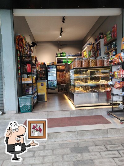 Take a seat at one of the tables at Grand Bakery