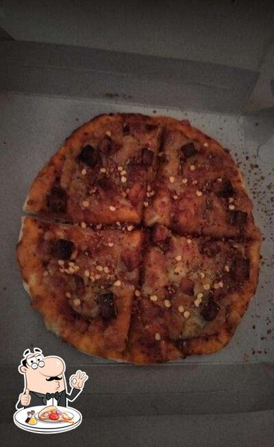 Get pizza at Waffi Caffi