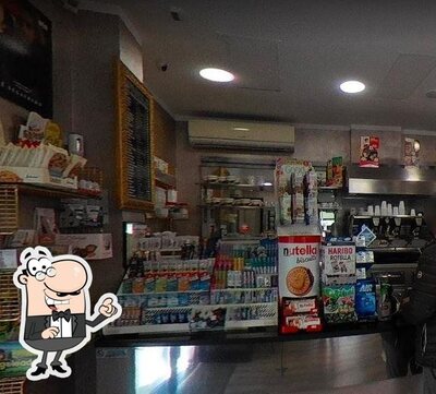Dai un'occhiata agli interni di L’angolo Tavola Calda