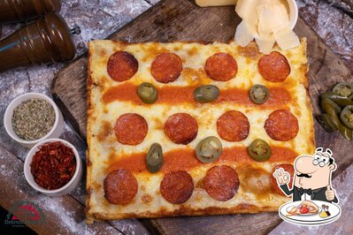 Get pizza at Detroit Pizzeria